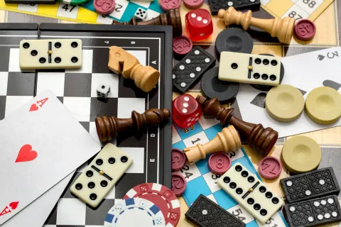 Cards, dice, chess, and other game pieces