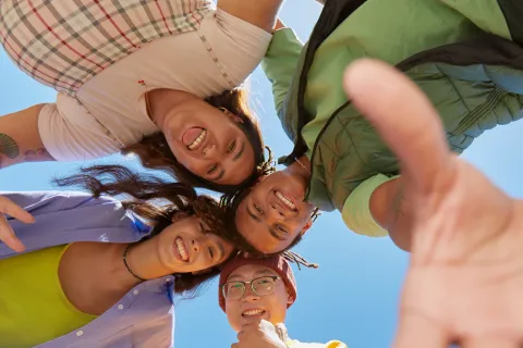 4 happy teens