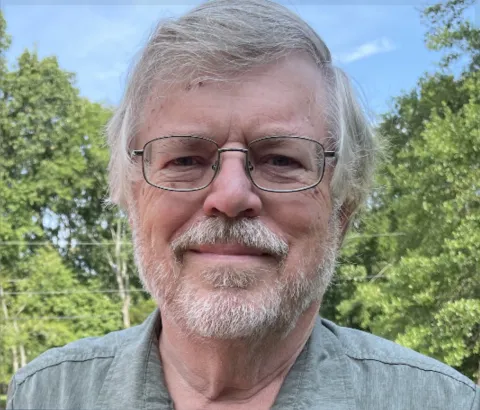 headshot of author Bob Crossman